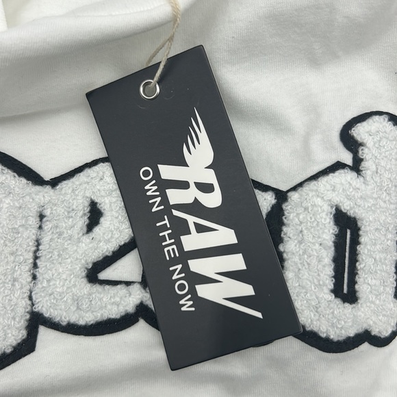 NWT RAW OWN THE NOW LEGEND NIPSEY HUSSLE MENS S WHITE GRAPHIC PATCH  T-SHIRT - Picture 9 of 11